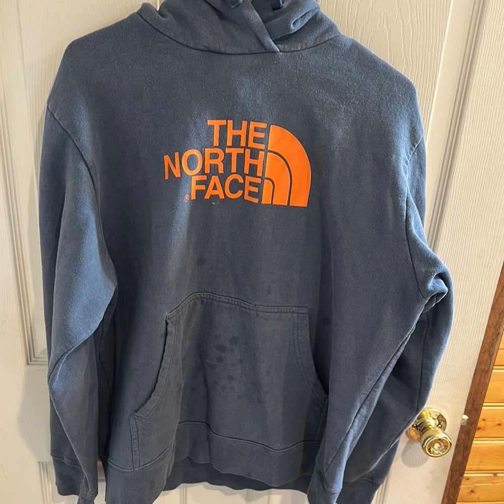 The North Face Navy Hoodie with Vibrant Orange Logo